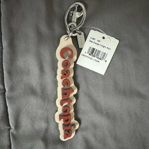 Coachtopia Cream Leather Keychain bag charm